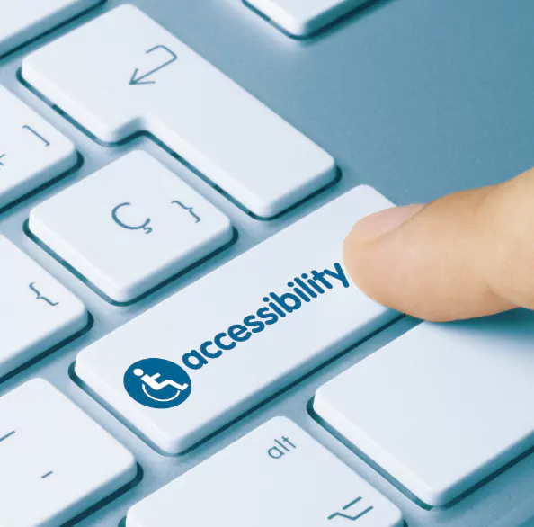 Finger Pressing Accessibility Button on Laptop
